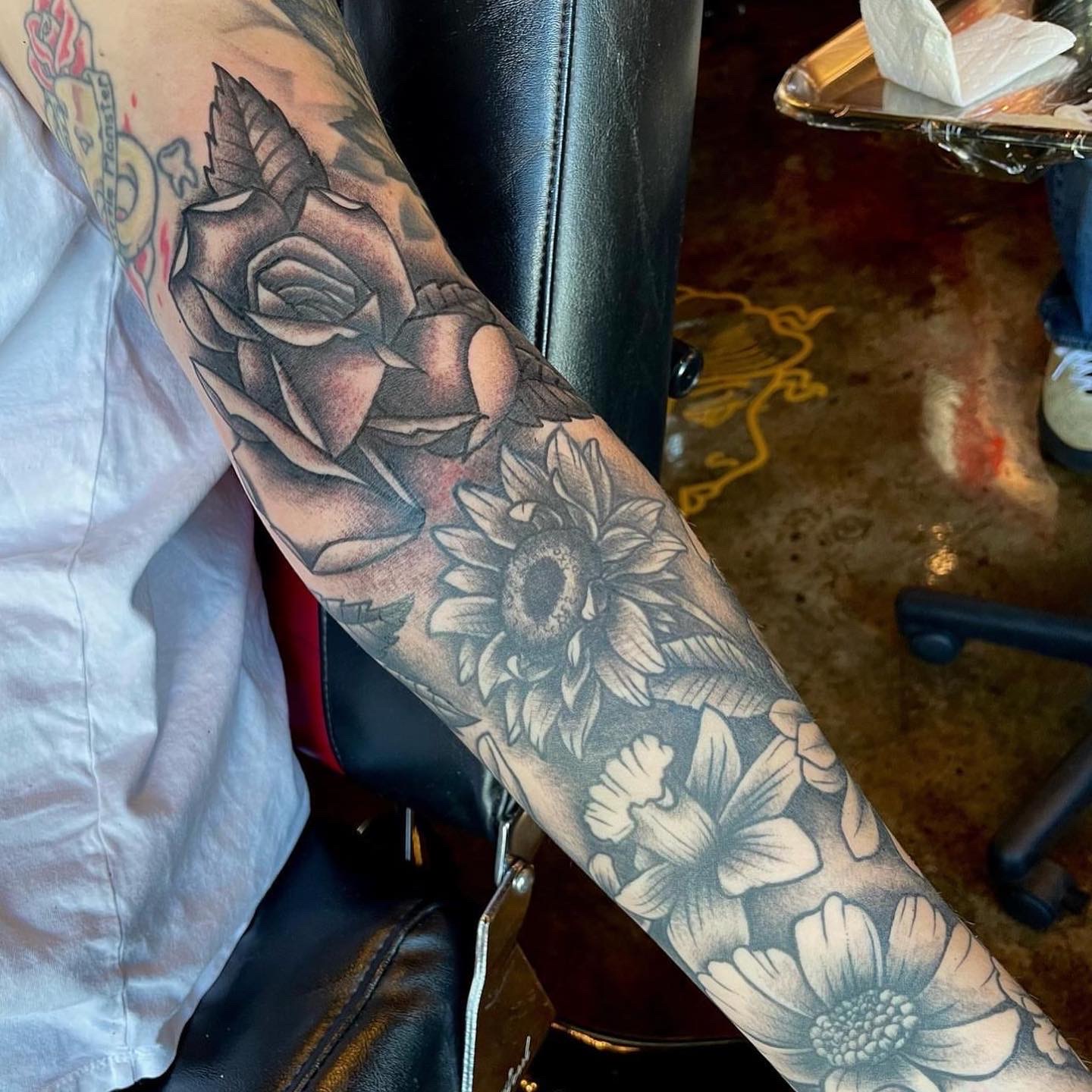 Tattoo of flowers on a arm from Dallas Tattoo shop