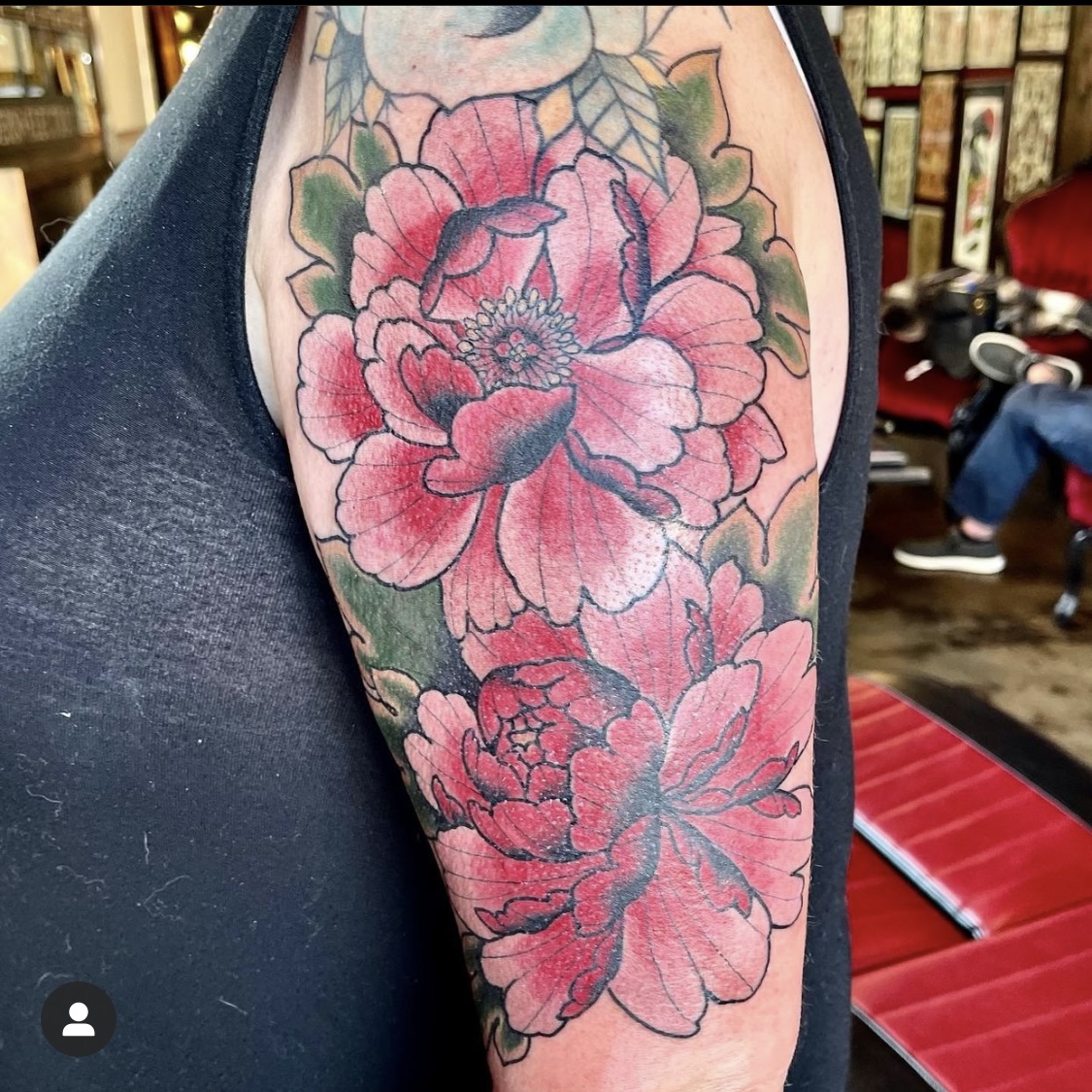 Large red flower tattoo from best tattoos in dallas