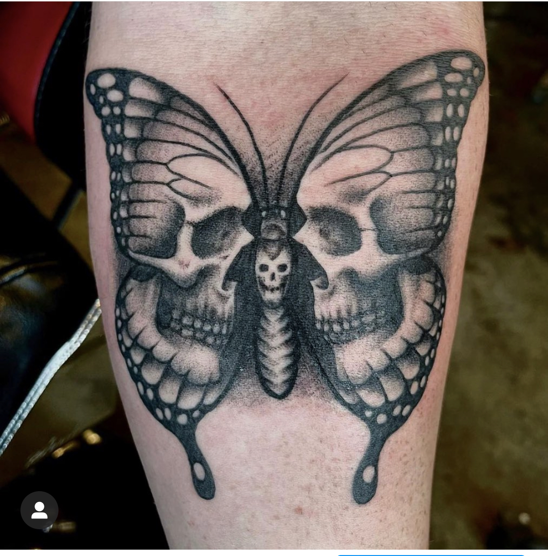 Skull butterfly tattoo by artist Jake Johnson.