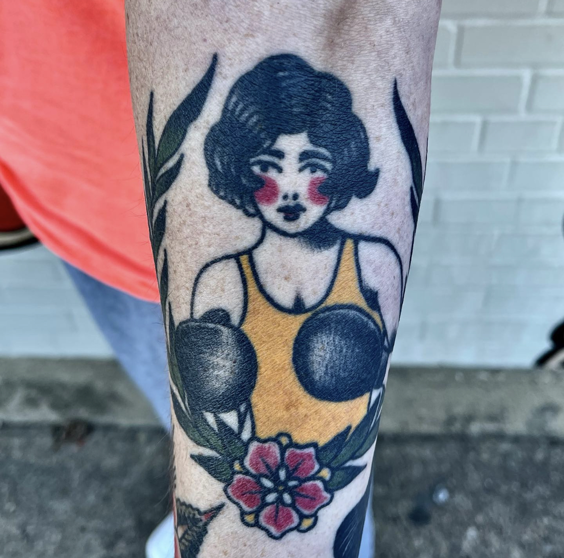 Boxer girl traditional tattoo. 5 years healed.