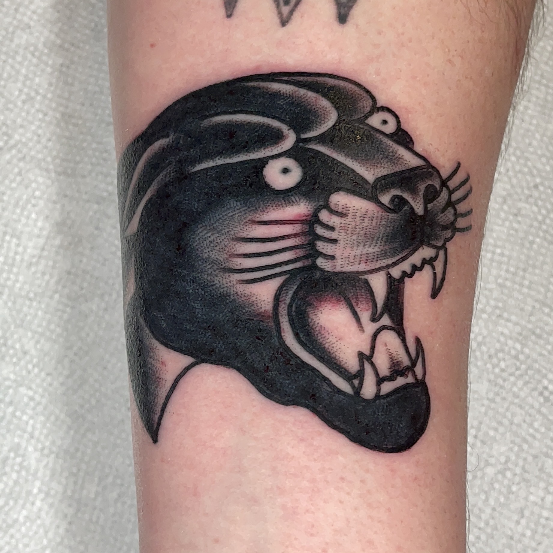 Tattoo of a panther from top Dallas tattoo artist