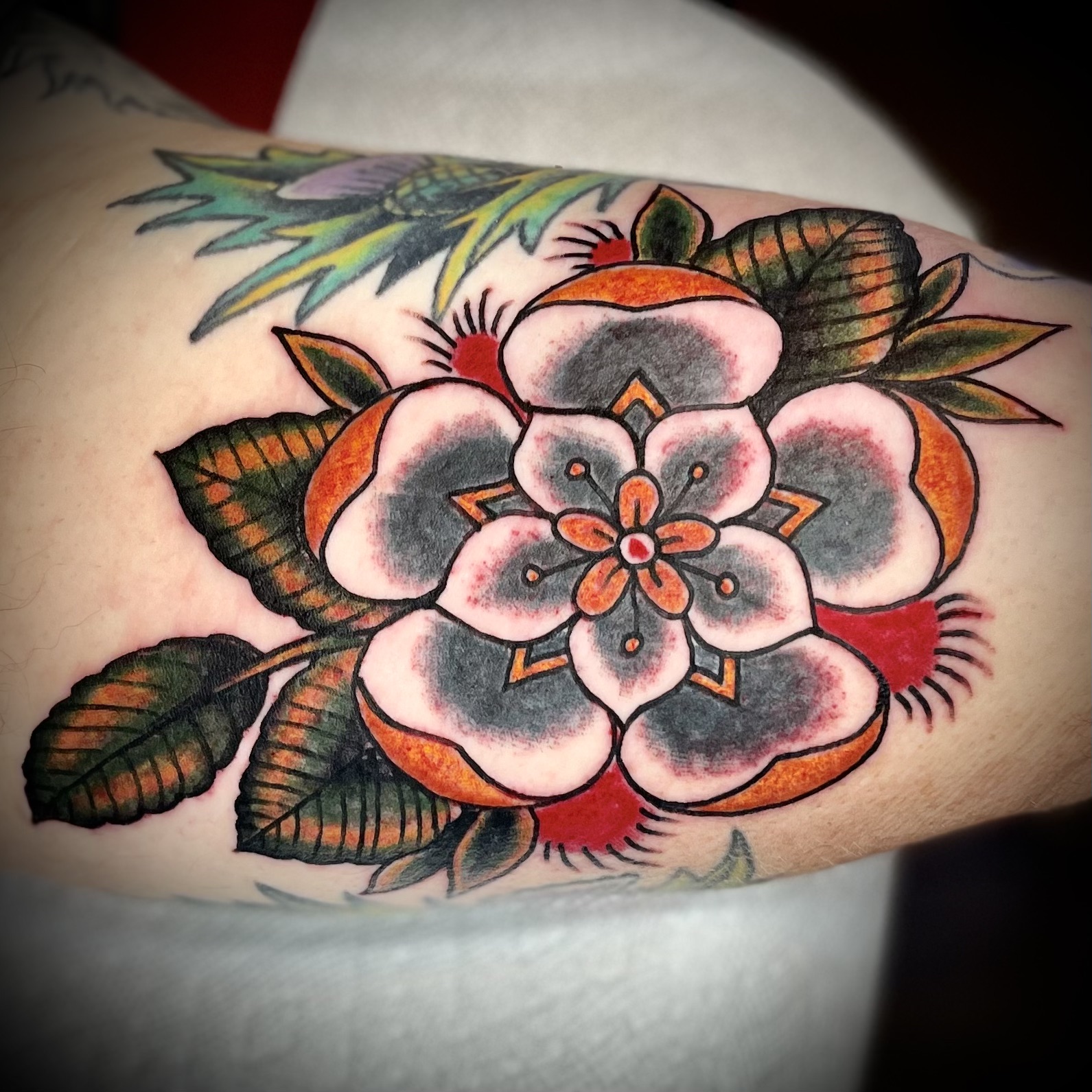 Tattoo of a flower from top dallas tattoo artists