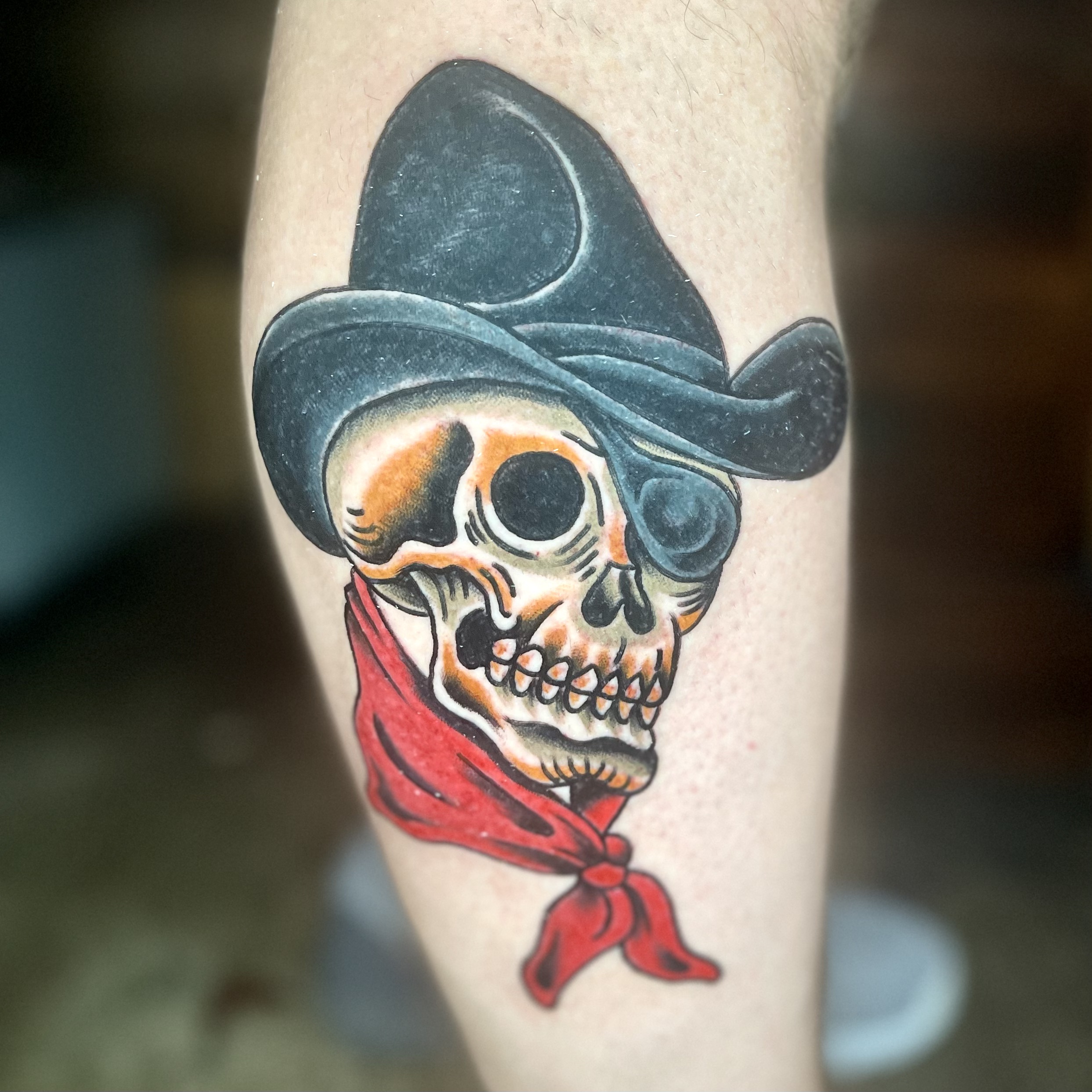 tattoo of a skull in a cowboy hat from top tattoo artists in dallas