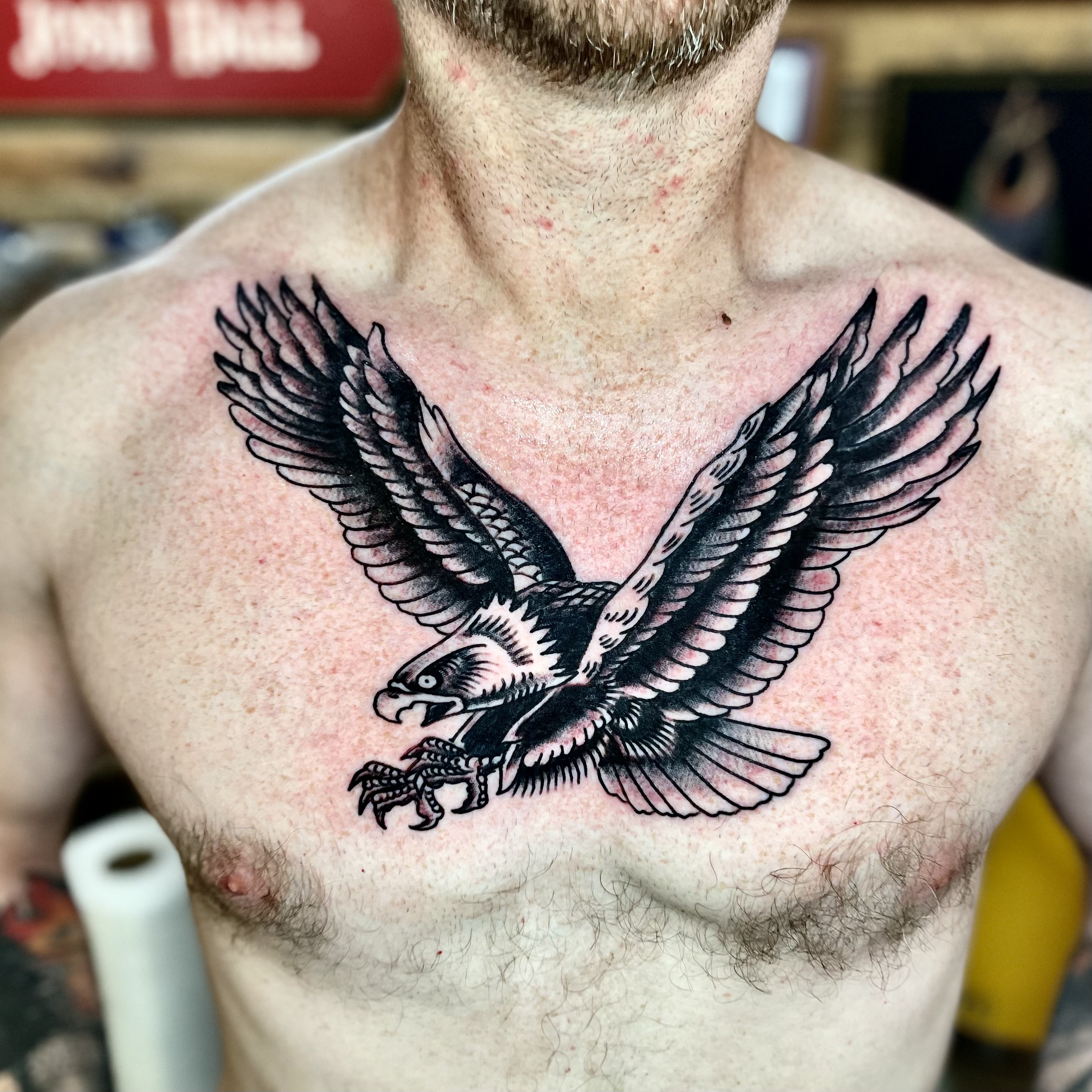 Large eagle tattoo on a man's chest