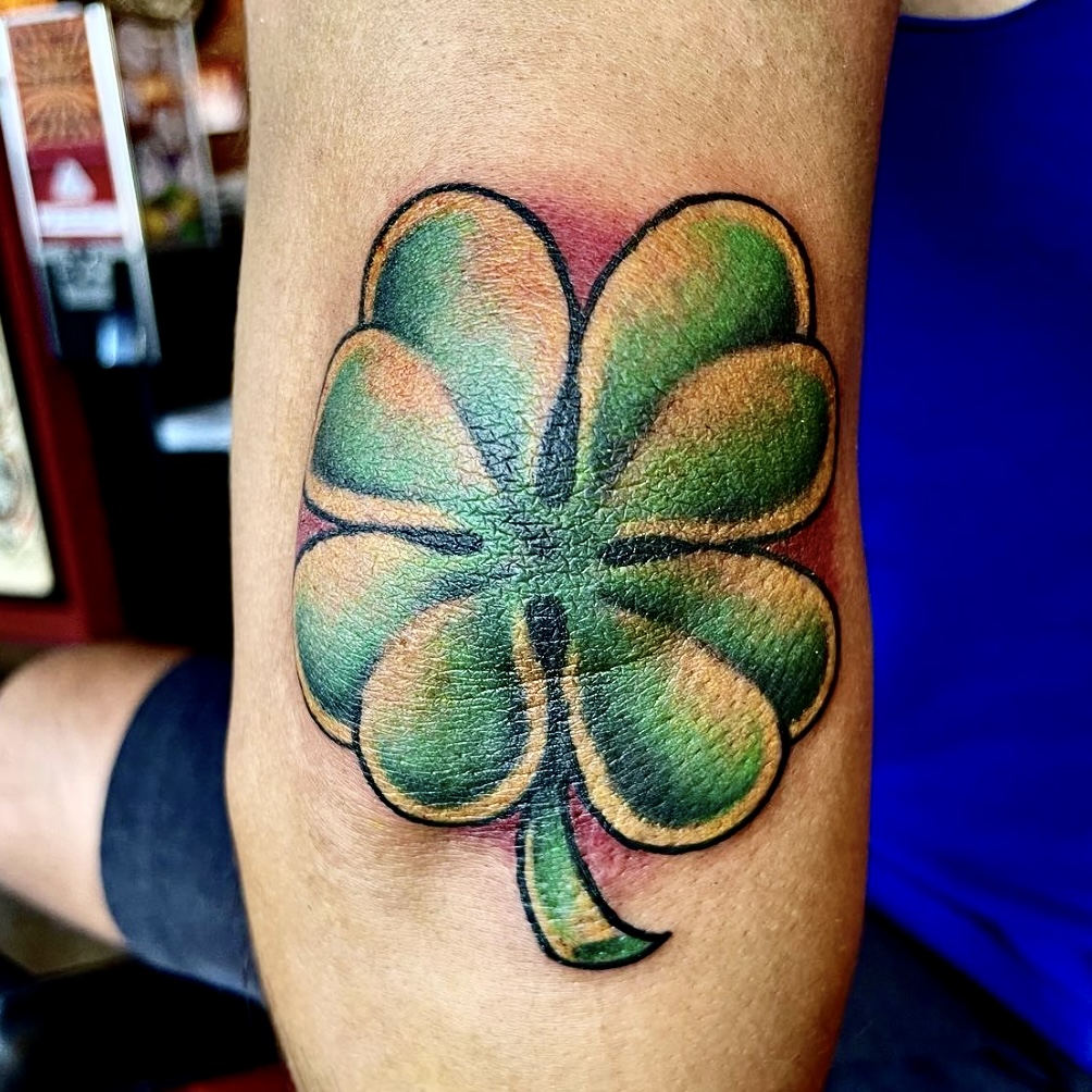 Tattoo of a green clover from top dallas tattoo artist