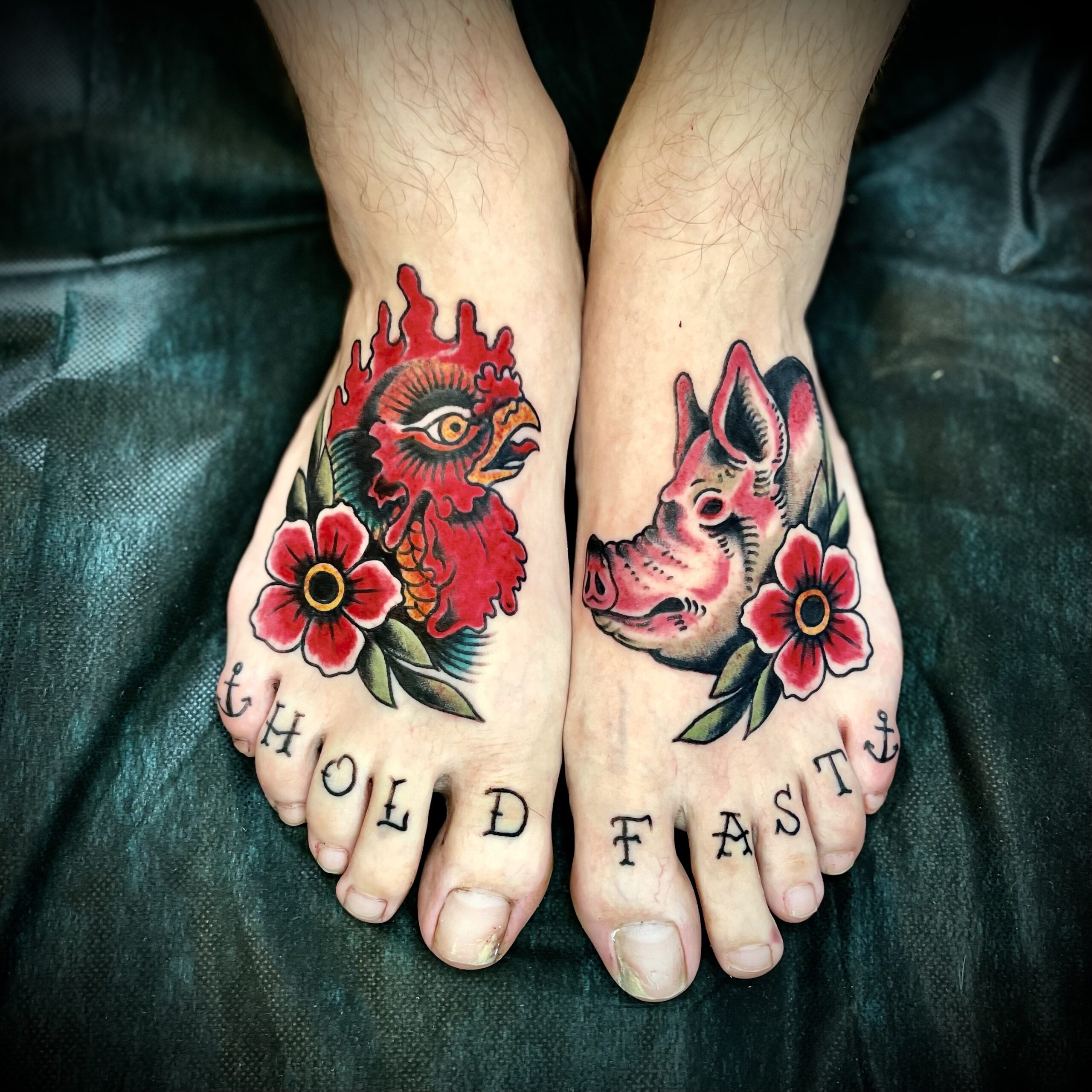 tattoo of a rooster and a pig on a man's feet