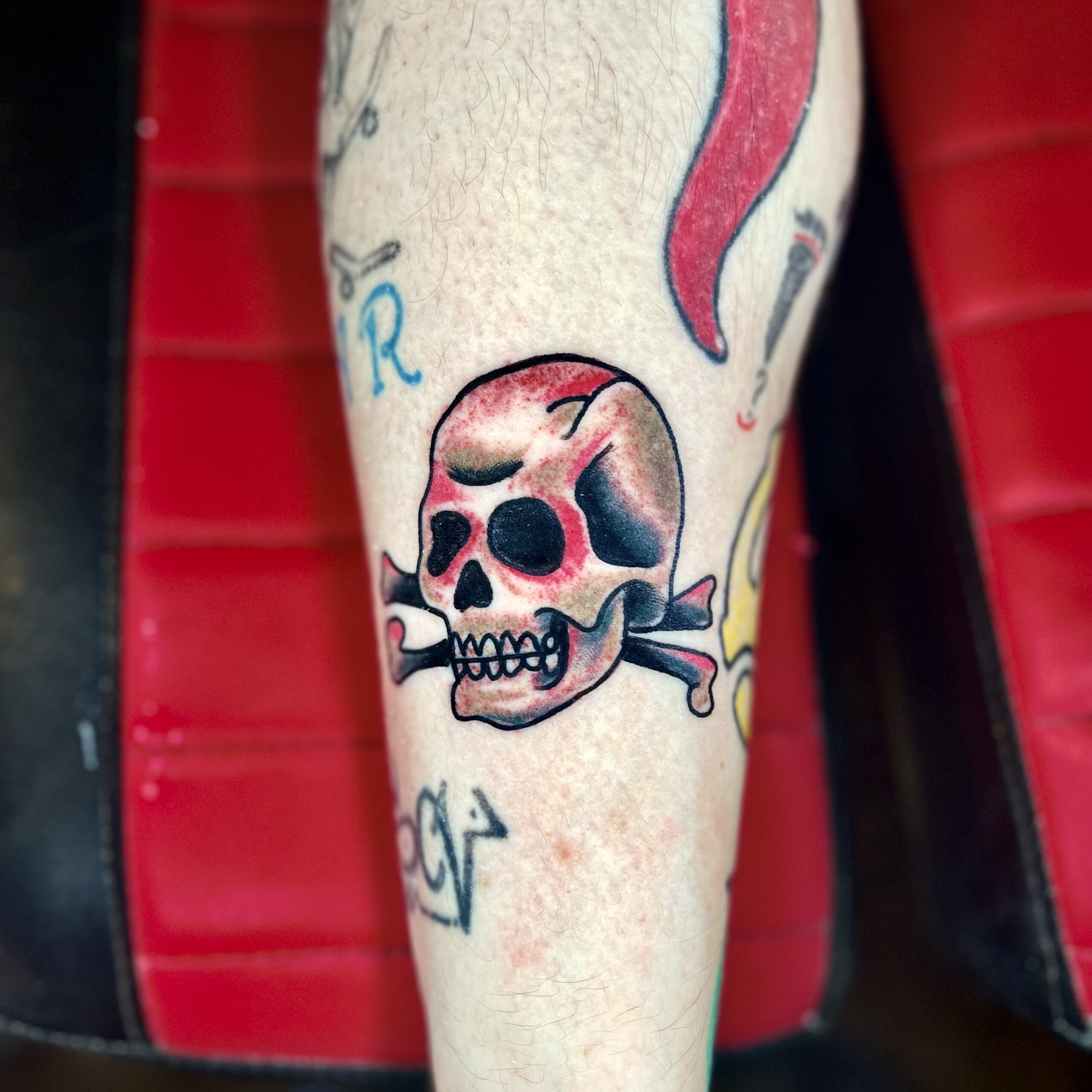 Tattoo of a skull and crossbones