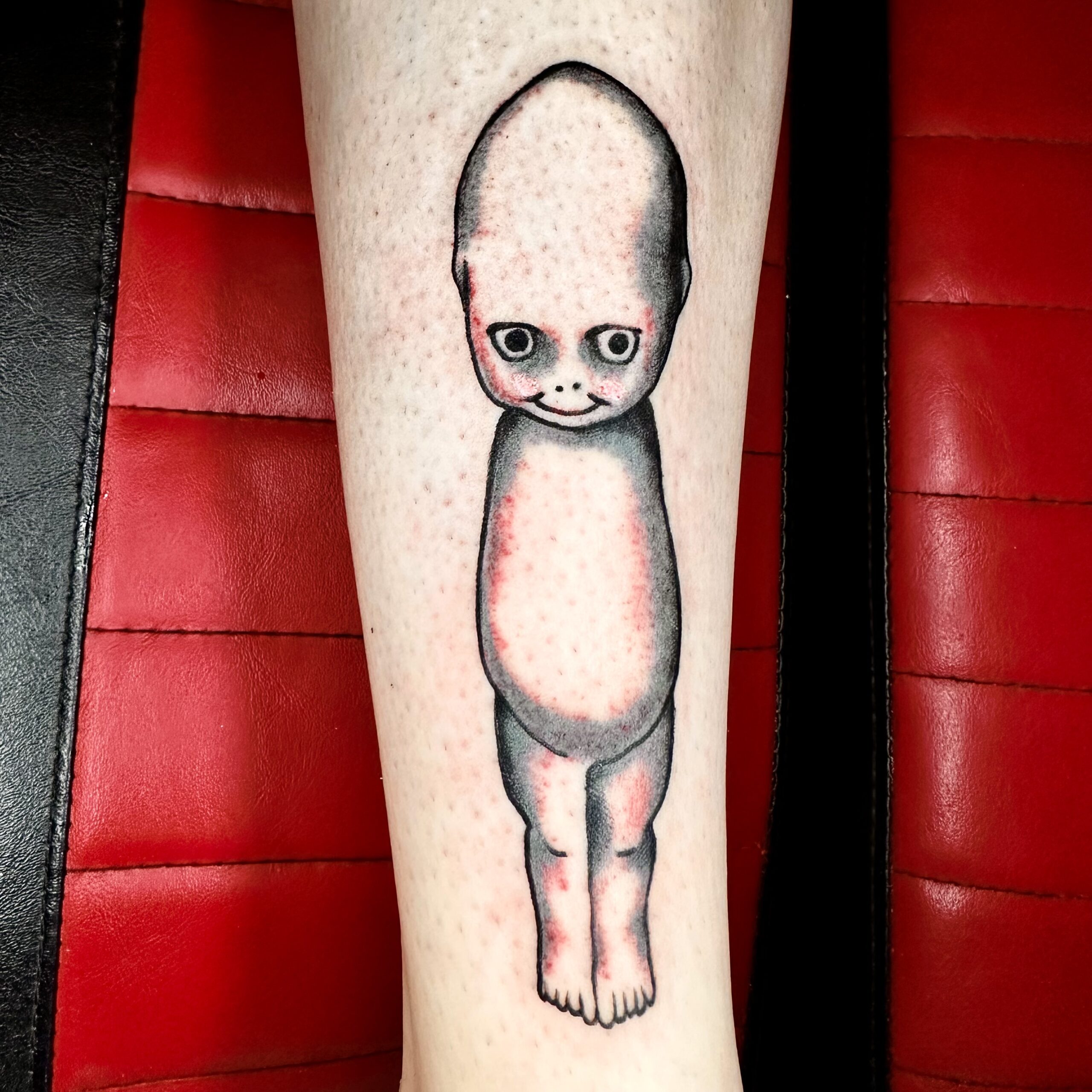 Tattoo of an alien from top Dallas Tattoo shop