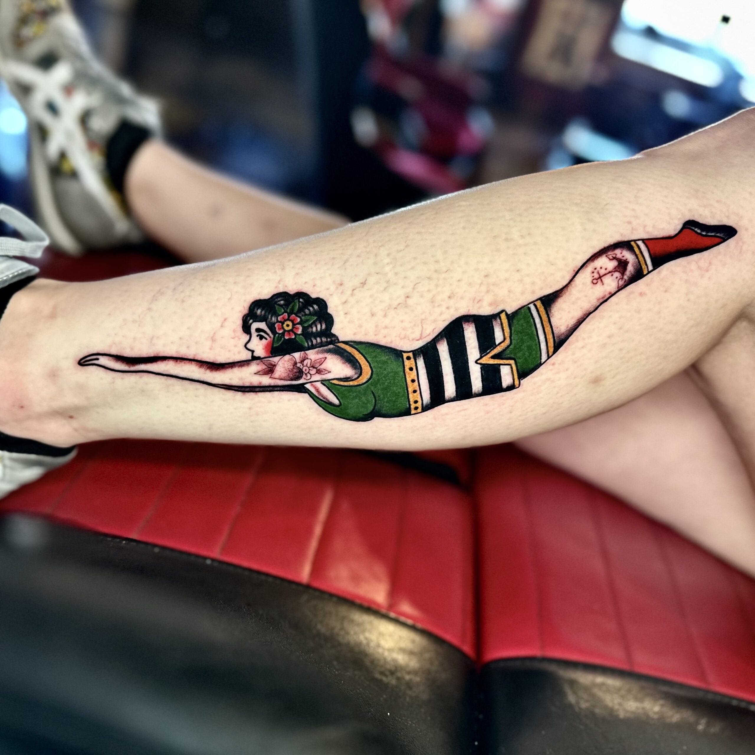 tattoo of a woman diving