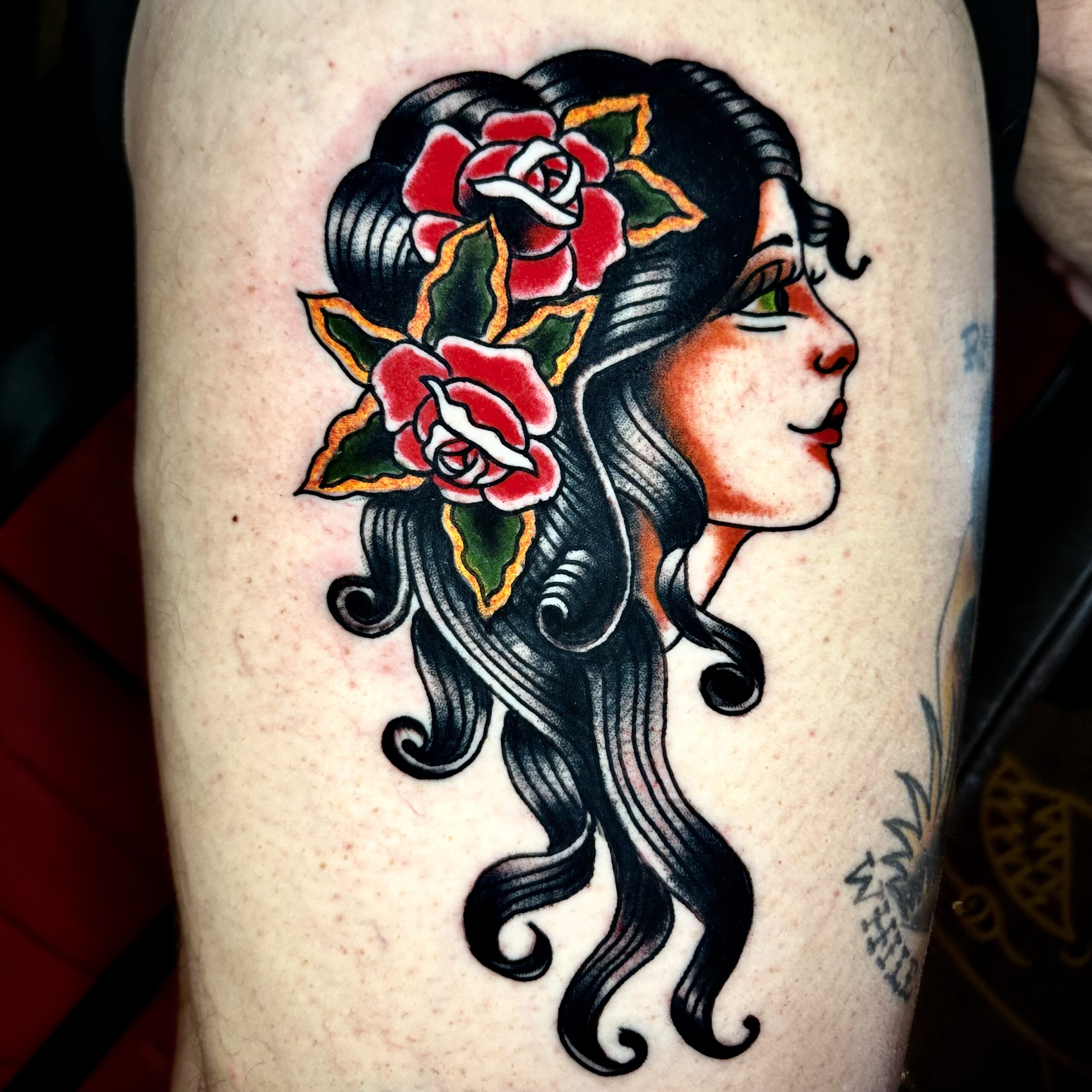 traditional tattoo of a woman