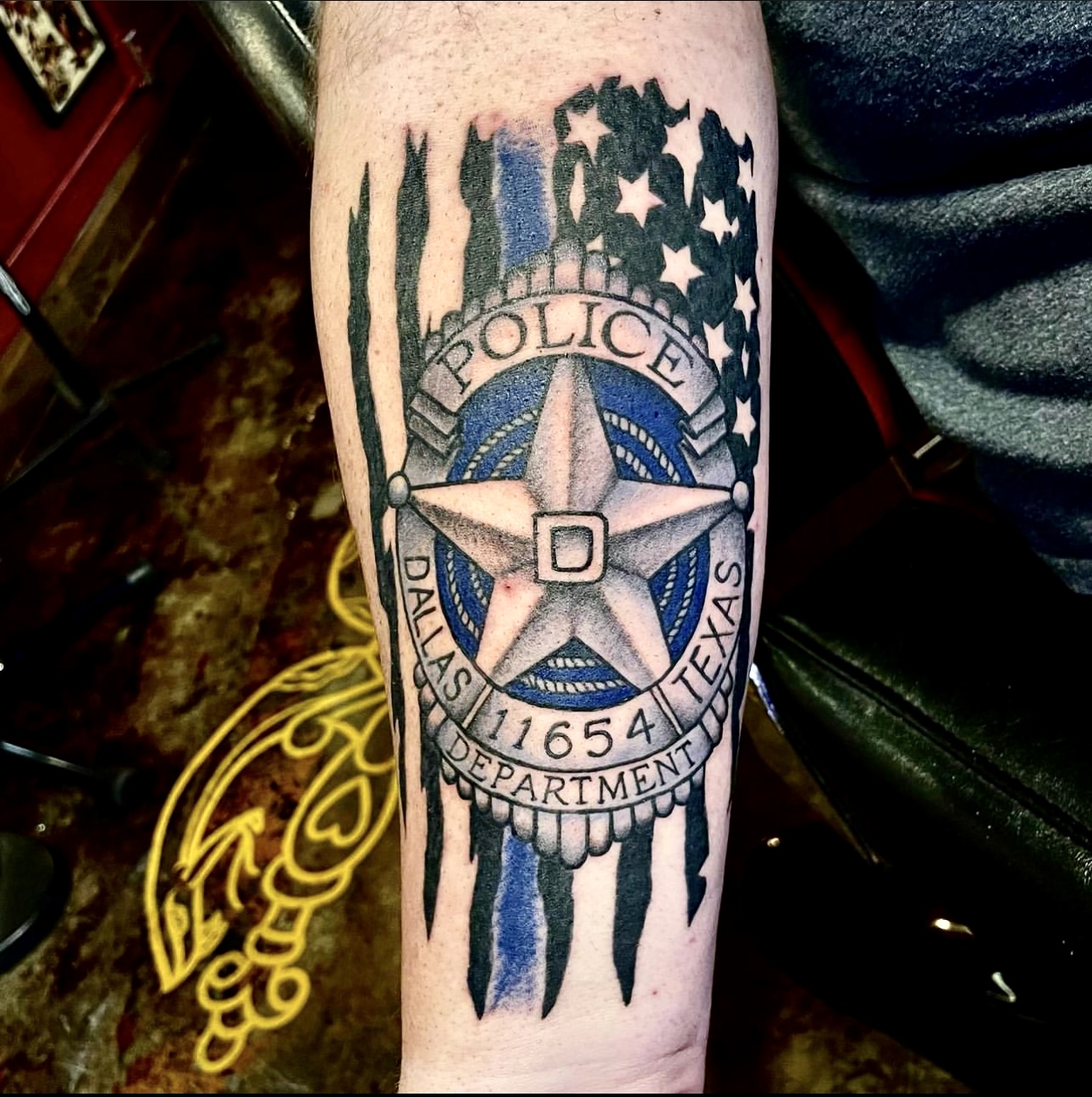 Tattoo of Dallas police logo