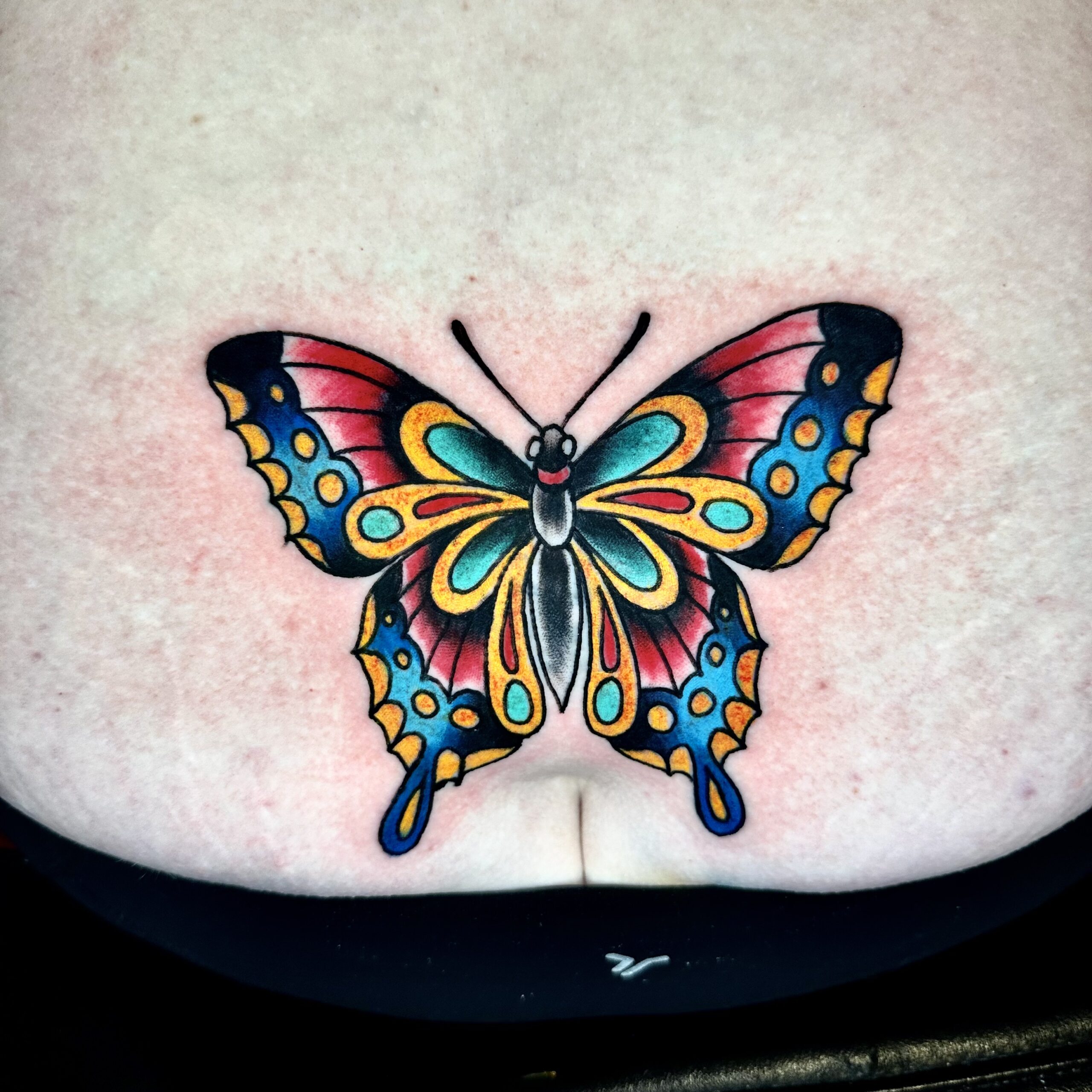 Tattoo of a colorful butterfly