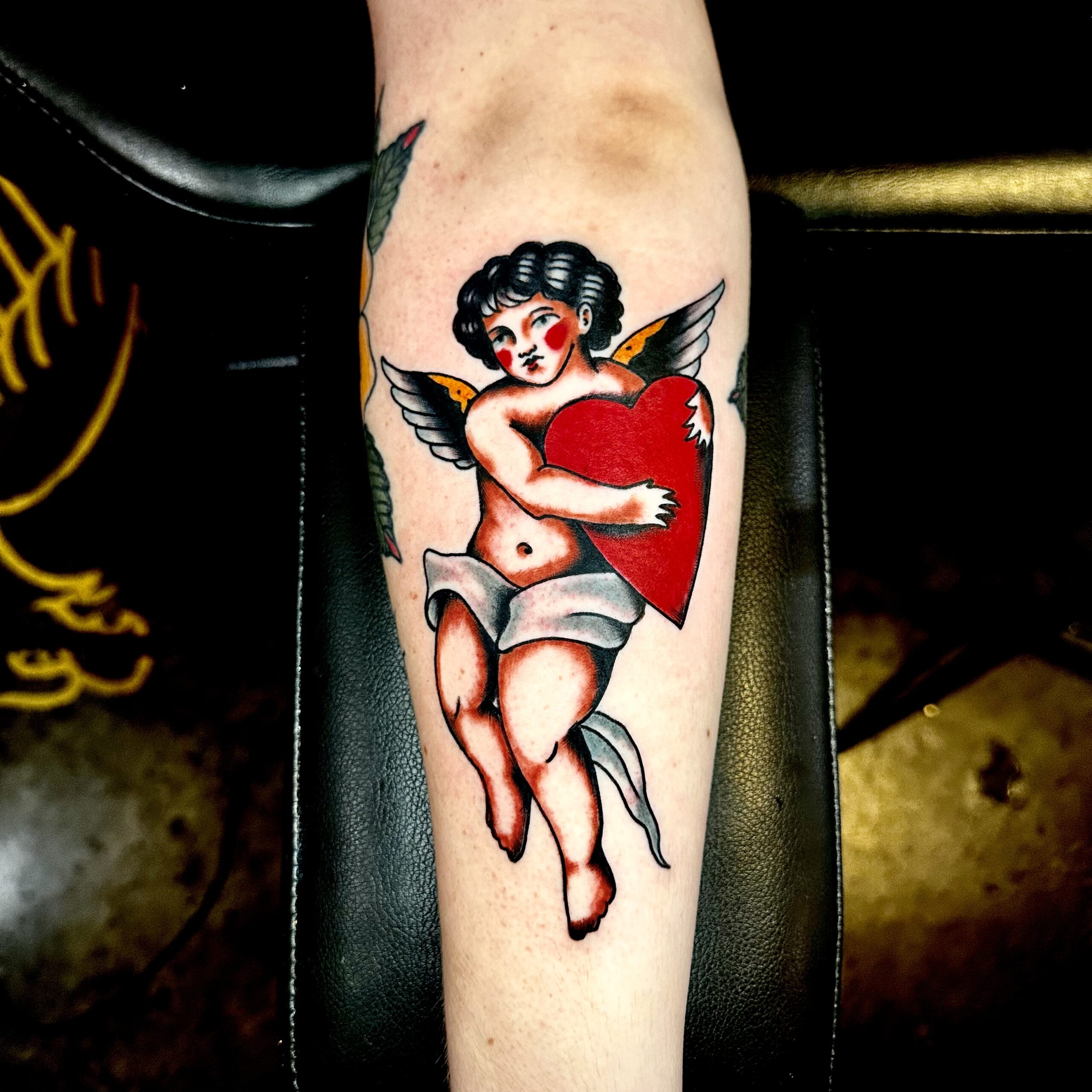 Tattoo of cupid from best tattoo shop in Dallas