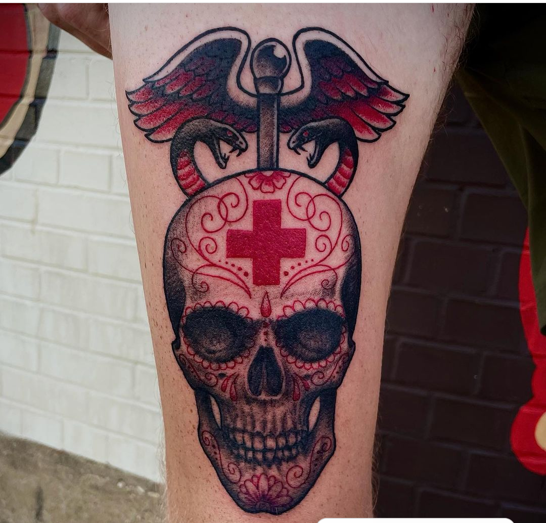 Tattoo of a red skull from best tattoo artist in dallas
