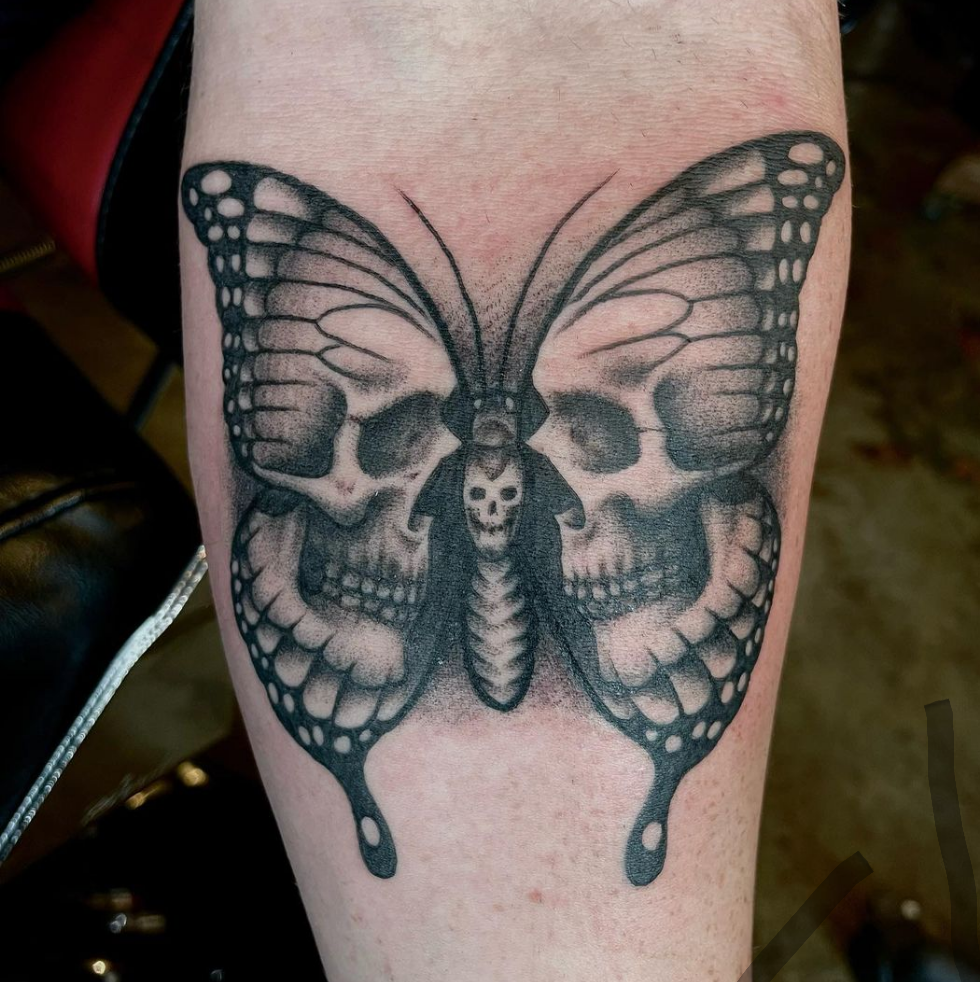 Butterfly tattoo with a skull on it in Dallas
