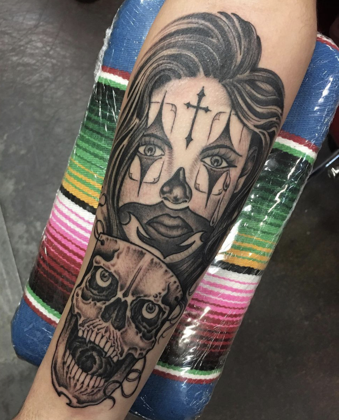 Face and skull tattoo from local shop in Dallas Texas