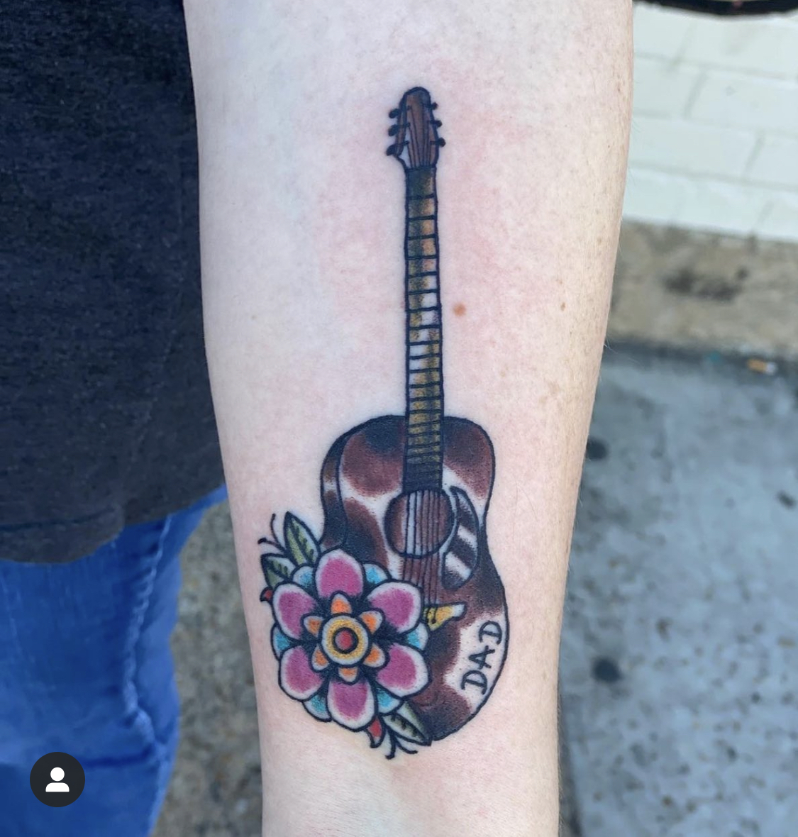 Tattoo of a guitar from top Dallas tattoo artist