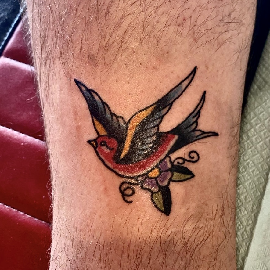 Tattoo of a bird from top Dallas artist