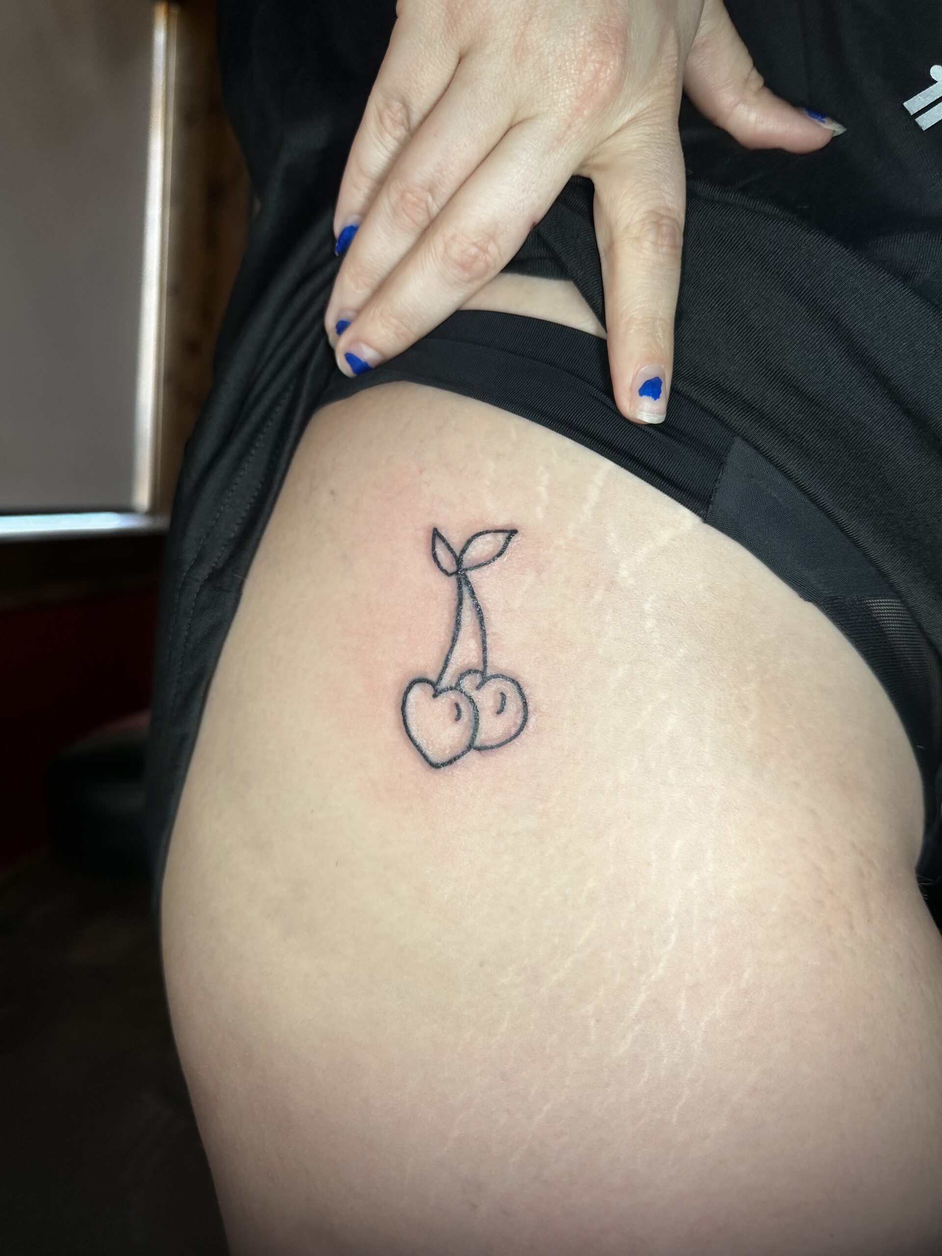 Tattoo of 2 cherries