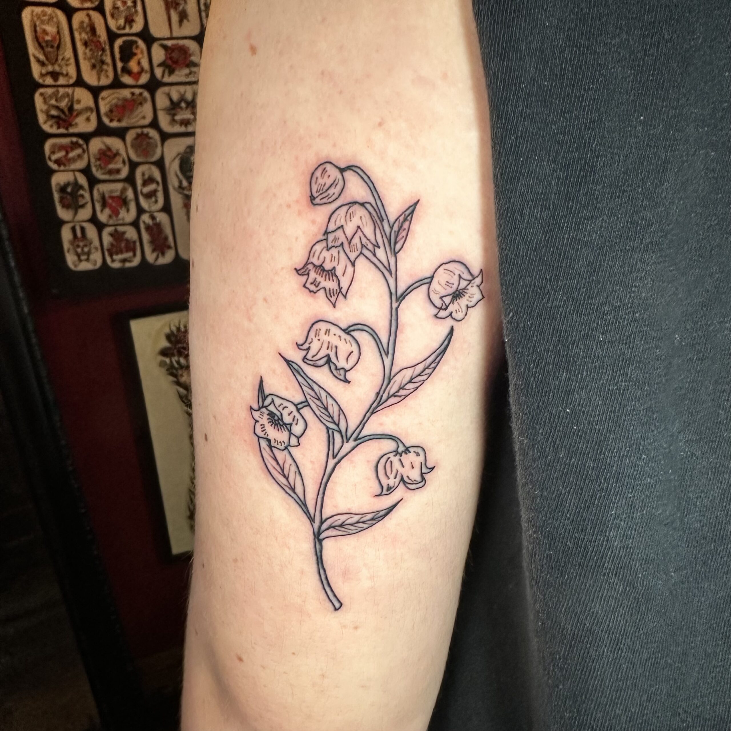 Tattoo of a flower from Dallas tattoo parlor