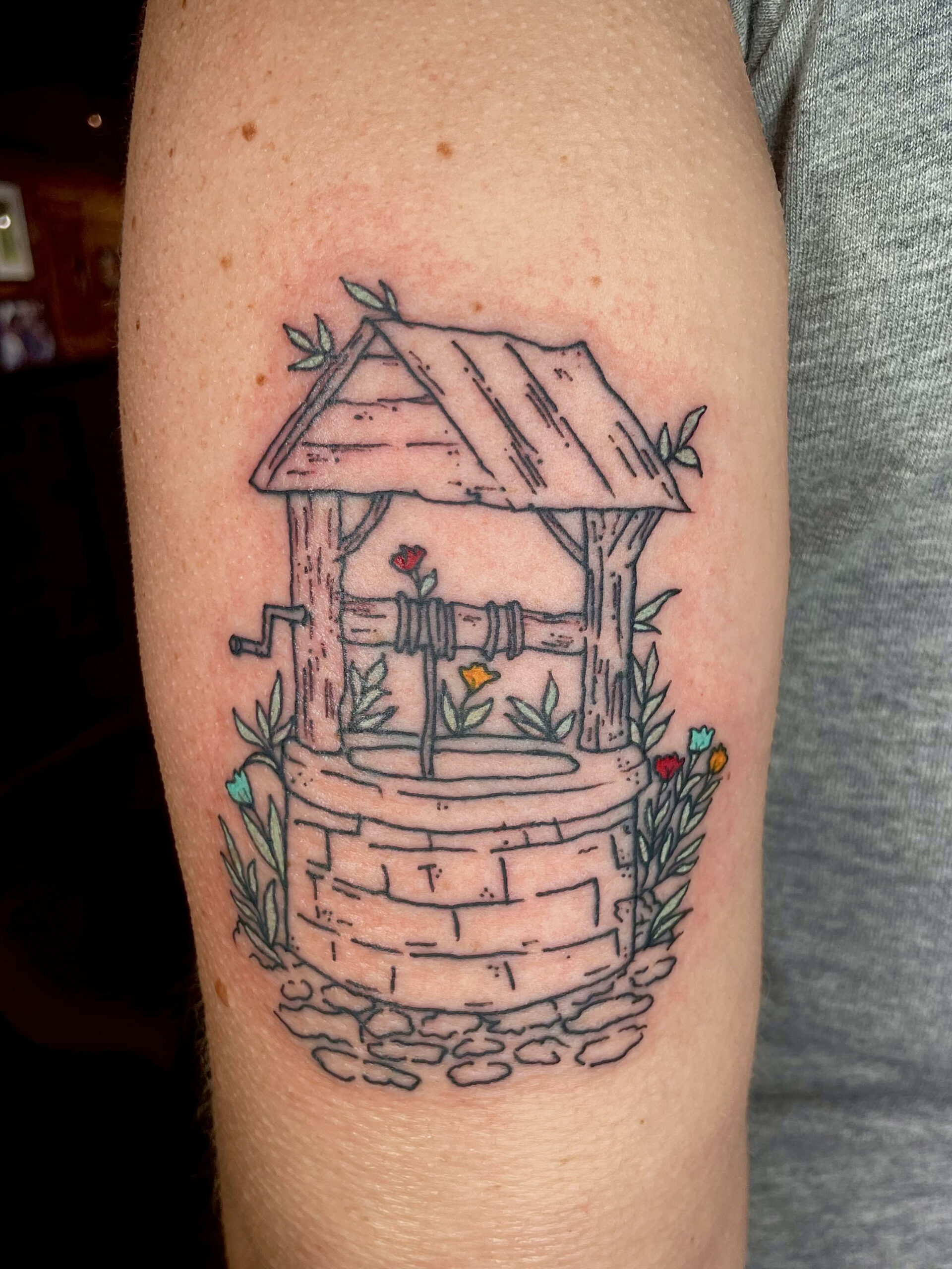 tattoo of a well from top dallas tattoo parlor