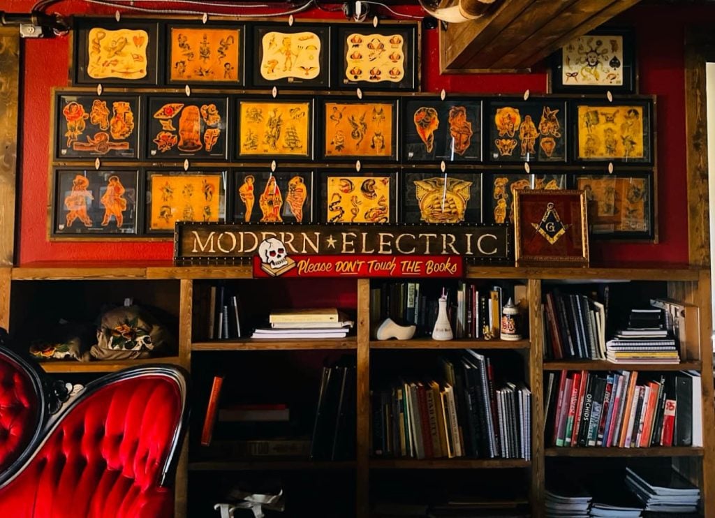lamar street tattoo shop interior - January 25, 2024 - Tattoo Artist - https://lamarstreettattooclub.com/blog/how-much-does-laser-tattoo-removal-cost/