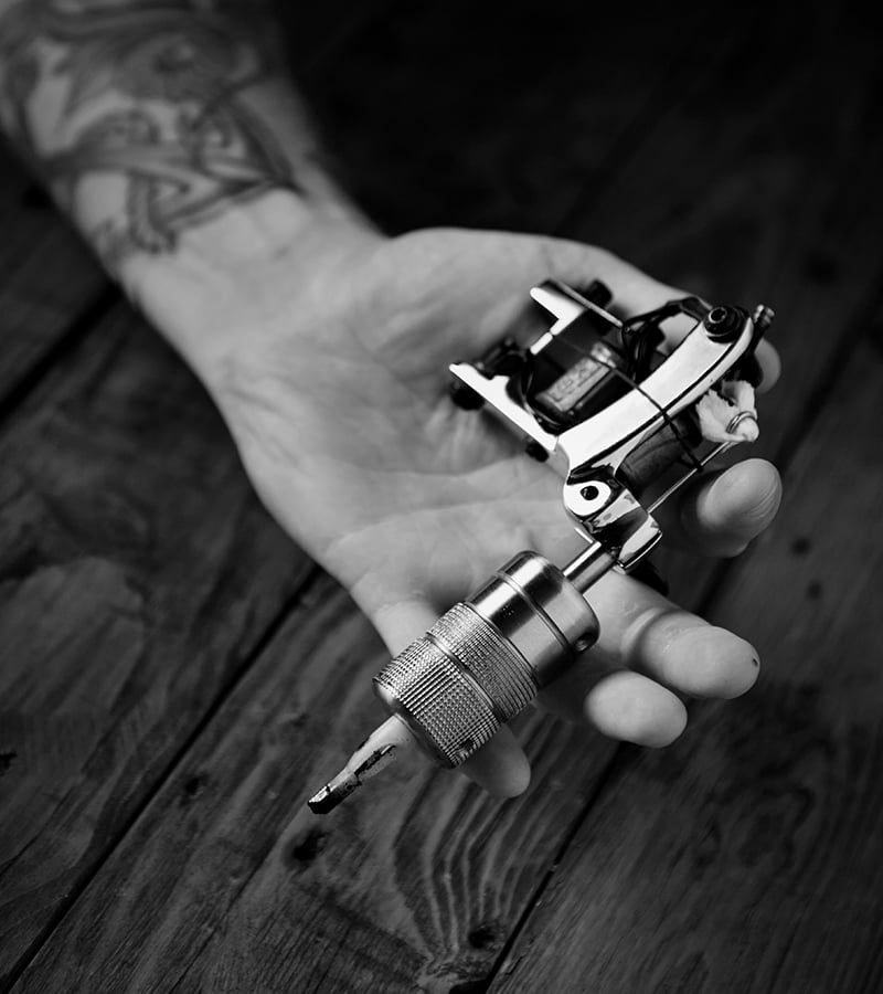 close up of a mans hand with tattoo gun 298DBHB - January 23, 2025 - - https://lamarstreettattooclub.com/